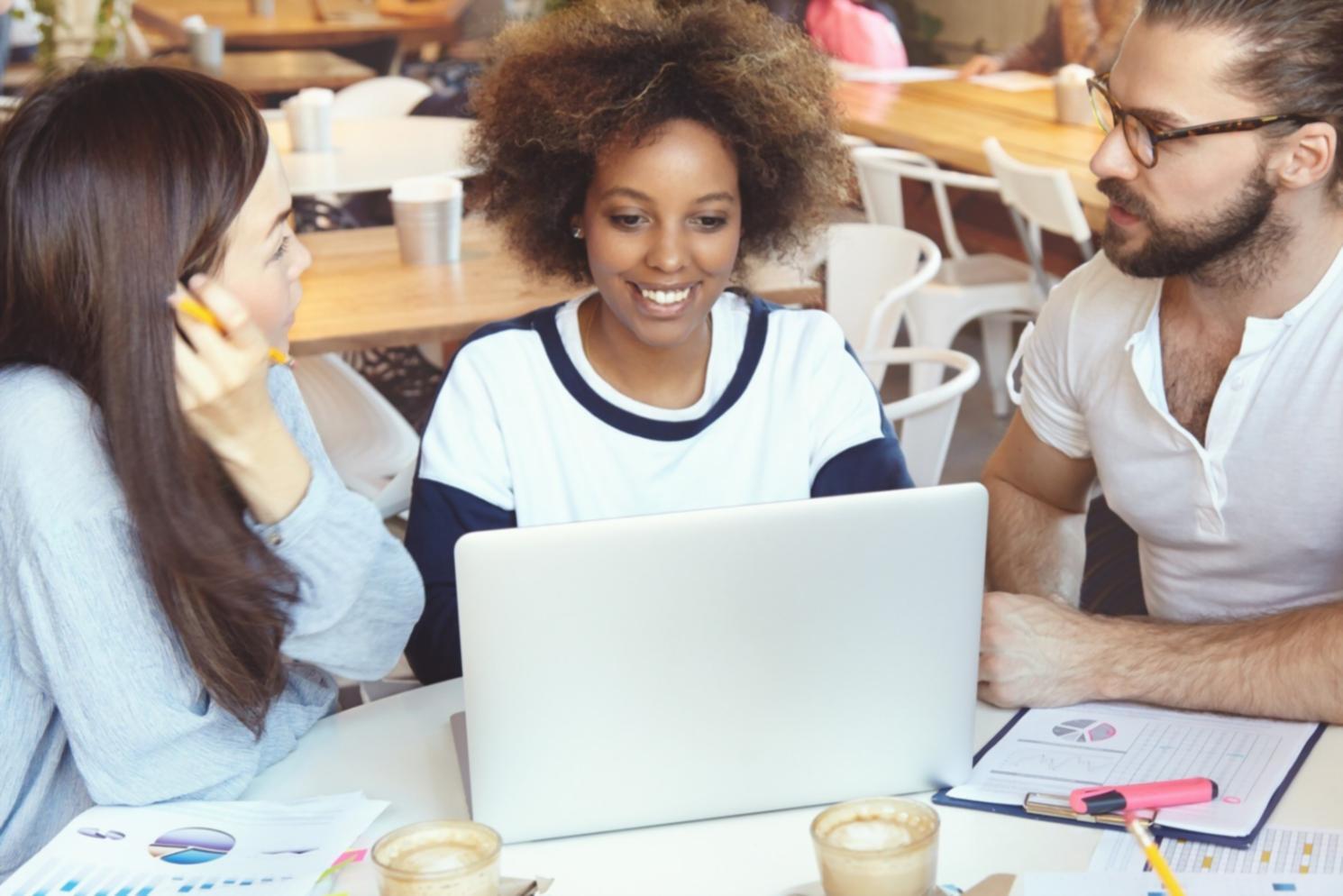 Business finance planning session with financial documents and calculator