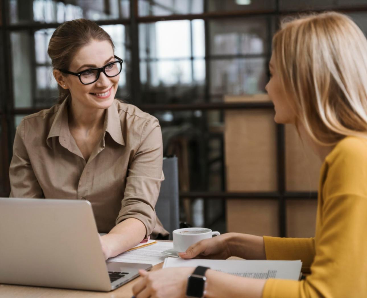 Business owner reviewing financial documents and planning budget